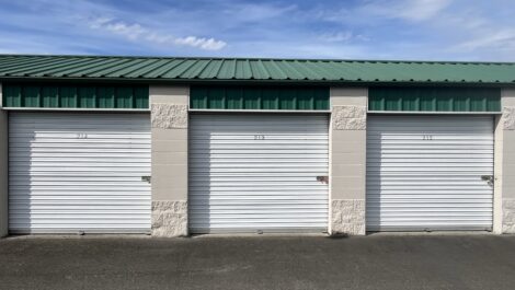 Close-up of multiple roll-up storage unit doors at the Glacier West Self Storage facility in Edgewood, Washington.